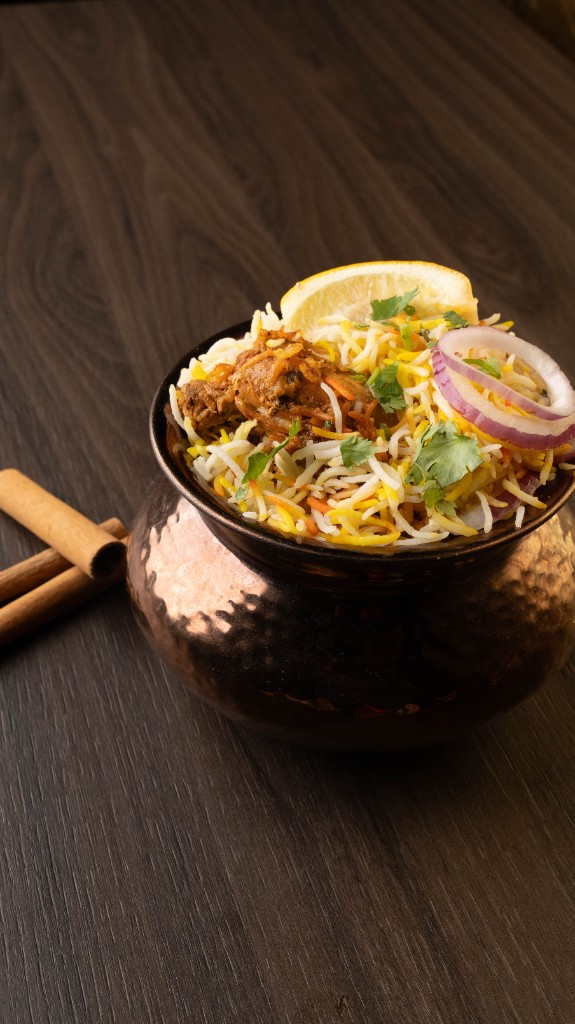 Dum biryani in a copper handi